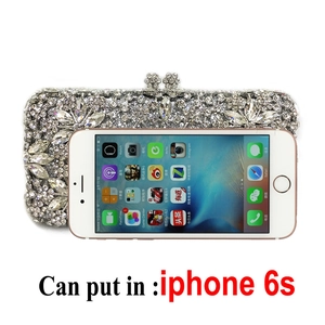 Detailed view of silver rhinestone evening bag interior capacity fitting an iPhone 6s