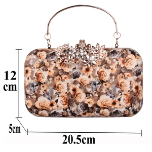 Floral evening clutch bag dimensions show 20.5cm length and crystal flower clasp detail
