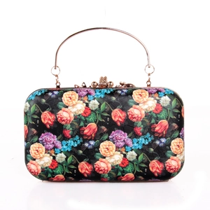 Black floral evening clutch bag with rose pattern and golden metallic handle on white background