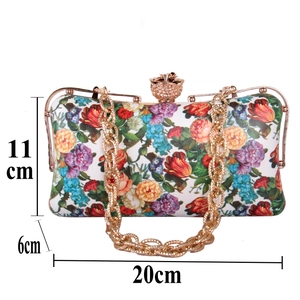 Detailed dimension view of white floral leather clutch bag with size 20cm x 11cm x 6cm