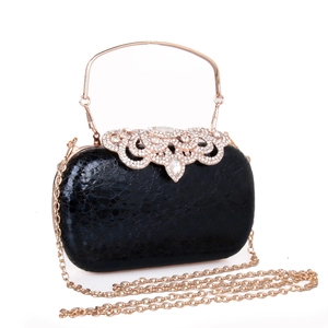 Elegant black evening clutch bag with sparkling rhinestone wave design and gold handle