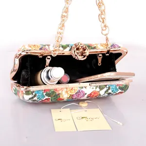 Floral print evening clutch bag with rose clasp, gold chain and interior view