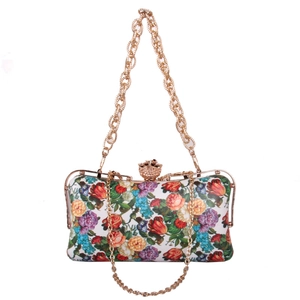 Floral print clutch bag with golden rose-shaped metal clasp and dainty chain strap
