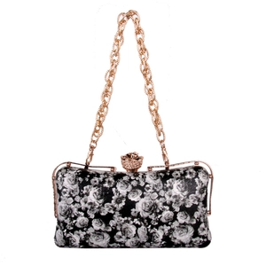 Elegant rectangular evening clutch with black and white rose print and crystal flower clasp