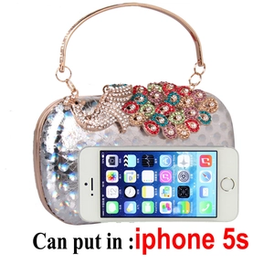 Silver glitter evening clutch bag with colorful rhinestone peacock and metal handle