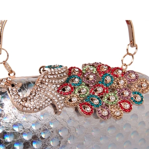Elegant peacock evening clutch with colorful rhinestones and silver holographic texture