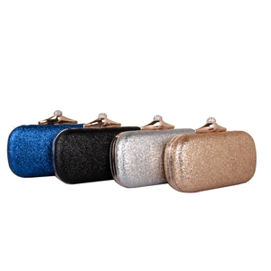 Elegant glitter evening clutch bags in blue black silver and gold with diamond clasps