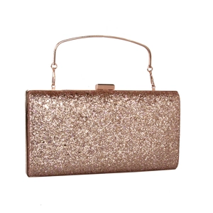 Detail of rose gold glitter evening clutch with elegant metal handle and snap closure