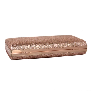 Side view of rose gold evening clutch featuring glitter sequins and a metal frame structure