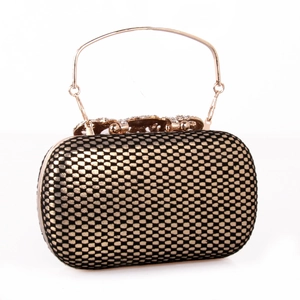 Close-up of black and gold grid texture clutch bag with rhinestone handle details