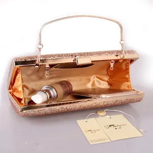 Elegant champagne gold evening clutch with glitter sequins and rose gold metal handles