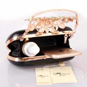 Black hard shell evening clutch with gold floral crystal clasp and spacious interior