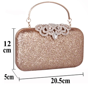 Detail view of rose gold sequin clutch with rhinestone clasp and dimensions 20.5x12x5cm