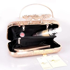 Rose gold glitter clutch bag with metal handle and bow clasp for evening parties