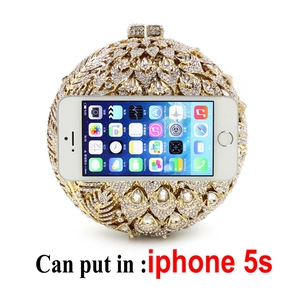 Golden round rhinestone evening bag with radial petal pattern and top clasp closure