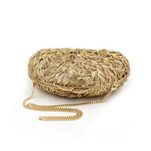 Detail of gold rhinestone evening bag with hollow leaf texture and detachable chain strap
