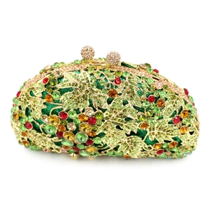 Detailed view of the luxury grape cluster rhinestones and golden leaf metalwork