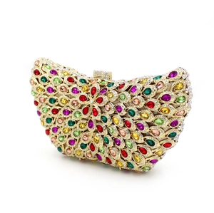 Detailed view of crescent evening clutch with colorful rhinestone floral pattern