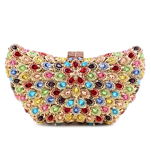 Luxurious hollow metal clutch bag with colorful rhinestones in peacock feather pattern
