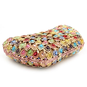 Detailed 45-degree angle view of luxury evening clutch with colorful rhinestones