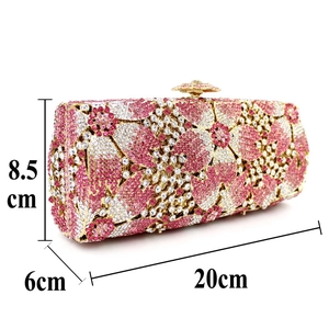 Detailed view of floral rhinestone evening clutch with dimensions 20cm x 8.5cm x 6cm