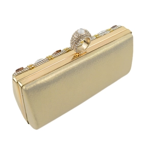 Elegant gold glitter evening clutch with sparkling rhinestone ring closure and gemstone