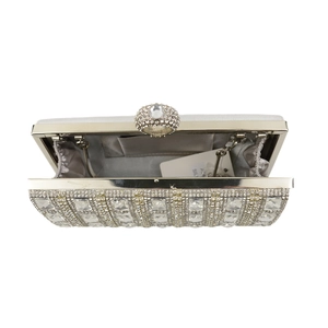 Detail of silver rhinestone evening clutch with ring handle and satin interior lining