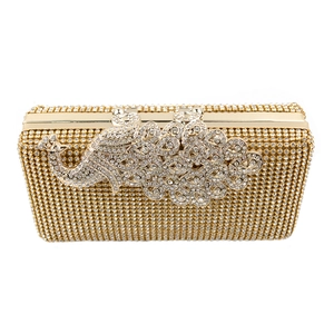 Detailed close-up of a golden peacock crystal evening clutch with sparkling rhinestones