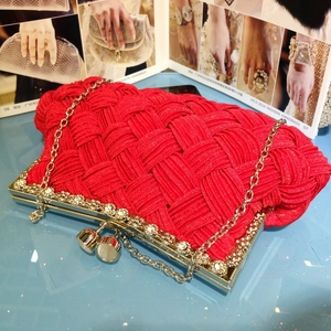 Red woven satin bridal clutch bag with gold rhinestone frame and delicate chain strap