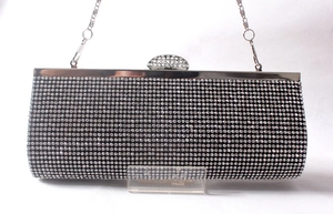 Sparkling crystal evening clutch bag with silver chain strap for formal party occasions