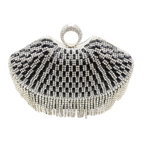 Detailed view of luxury evening clutch featuring black water diamonds and crystal tassels