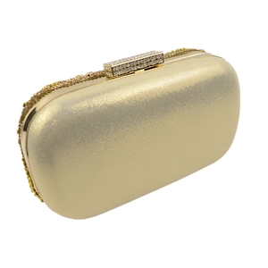 Pochette de soirée dorée élégante avec texture scintillante et fermoir orné de strass