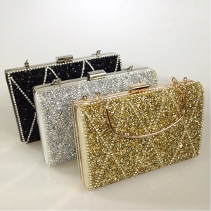 Luxury rhinestone evening clutches in black, silver, and gold with metal chain handles
