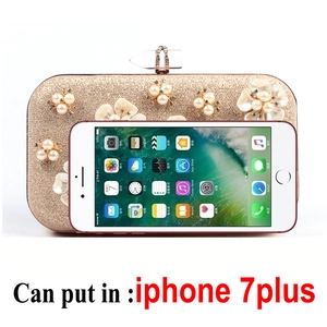 Champagne gold glitter evening bag with pearl flowers and iPhone 7 Plus size reference