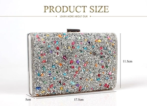 Detailed size view of luxury evening clutch bag with colorful stones and rhinestones