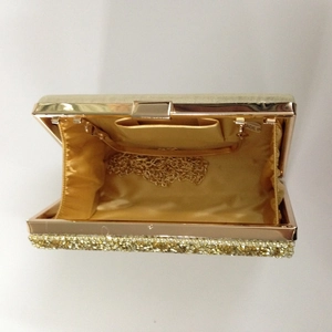 Sparkling gold sequin evening clutch bag with chain strap and metallic clasp closure