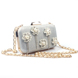 Silver satin evening clutch with pearl flower rhinestones and sparkling metallic tassels