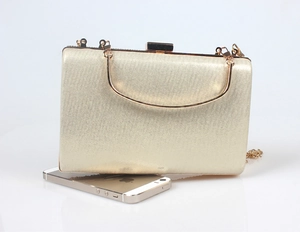 Sparkling mermaid evening clutch bag with fine glitter and metallic top handle