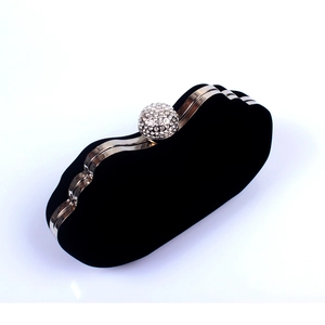 Elegant black velvet evening clutch with a sparkling rhinestone ball clasp and silver metal frame