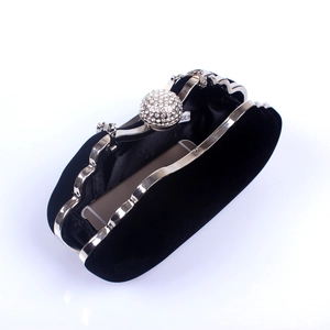Black velvet evening clutch bag with silver metal frame and rhinestone ball clasp