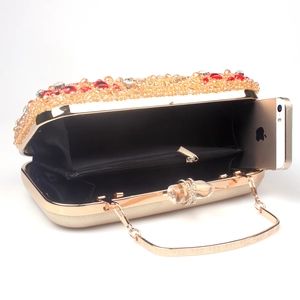 Champagne gold evening clutch bag with red crystals showing phone capacity and chain