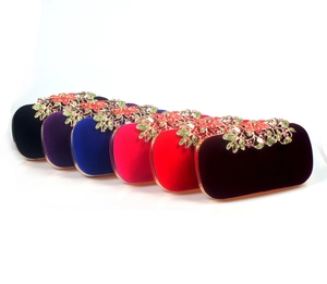 Elegant velvet evening clutch bags with floral rhinestone frames in six vibrant colors