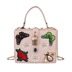 Pink evening bag with butterfly embroidery, pearl flowers and rhinestone accents