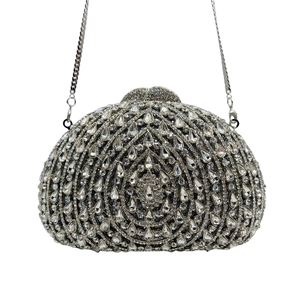 Luxurious silver fan-shaped clutch bag with radiant crystals and detachable chain strap