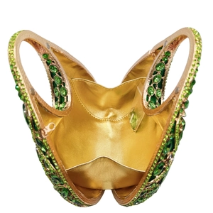 Luxurious gold clutch bag with green crystals in a heart shape for evening parties