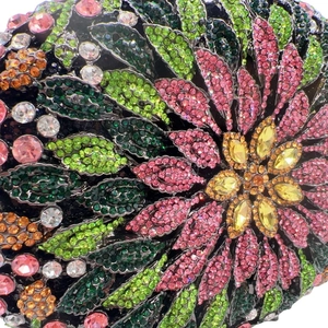 Luxurious crystal evening clutch bag with intricate pink flower and green leaf patterns