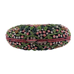 Exquisite floral rhinestone pattern detail on a luxury black evening clutch bag