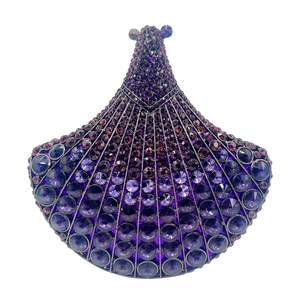 Detailed close-up of fan-shaped clutch bag with purple gradient rhinestone embellishment