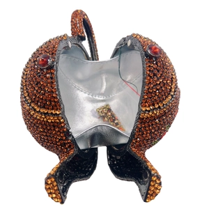 Crystal pomegranate evening clutch bag in amber orange rhinestones with silver lining