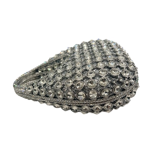 Close-up of luxury teardrop evening clutch with sparkling silver crystal rhinestones